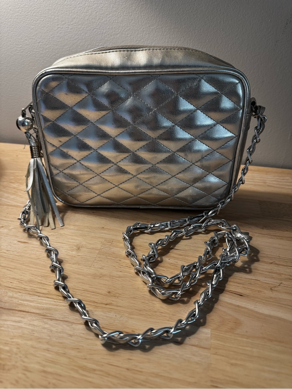 Chateau Metallic Quilted Silver Crossbody with Tassel